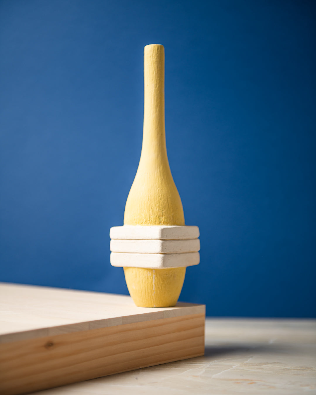 Simply yellow vase is an unconventional vase design that defy the usual .