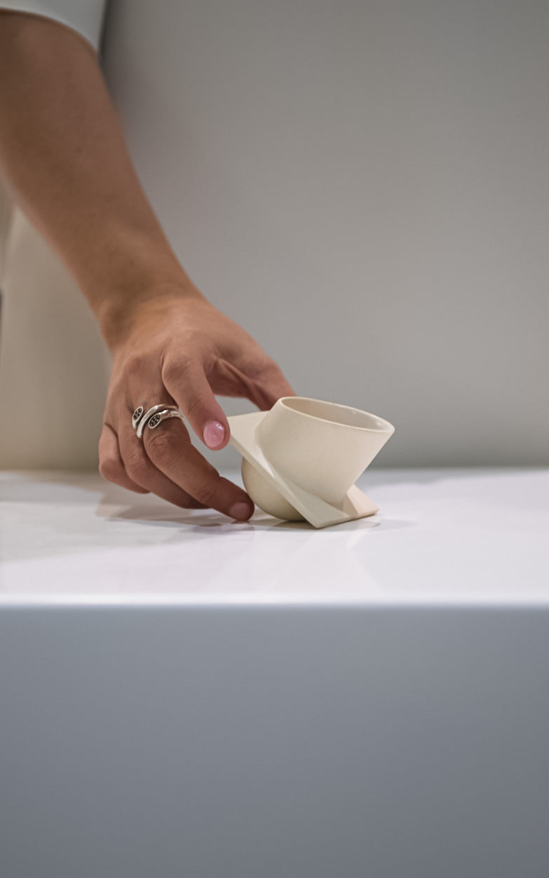 A unique ,unconventional laying cup for espresso,Arabic or Turkish coffee as well as Japanese tea and desert verrine .